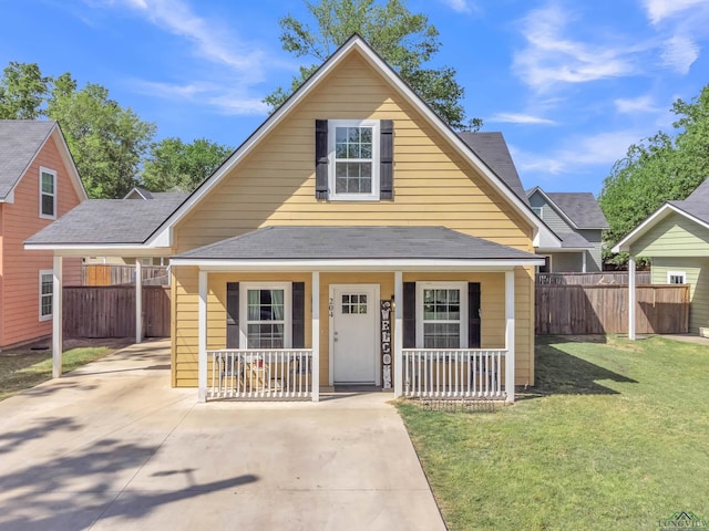 204 Hurley Ave, Gladewater, TX 75647 - bungalow with a front yard, a porch, fence, an attached carport, and driveway
