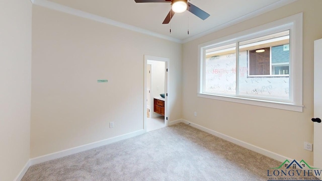 2509 Windmill Ln, Longview, TX 75601 - unfurnished bedroom with carpet floors, connected bathroom, and ornamental molding