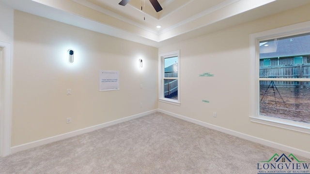 2509 Windmill Ln, Longview, TX 75601 - carpeted empty room featuring ceiling fan, a raised ceiling, and recessed lighting