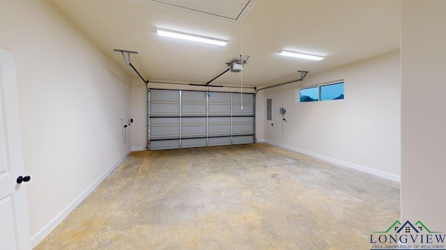 2509 Windmill Ln, Longview, TX 75601 - garage featuring electric panel and a garage door opener