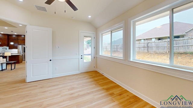 2509 Windmill Ln, Longview, TX 75601 - spare room with light wood-style flooring, a ceiling fan, recessed lighting, and vaulted ceiling