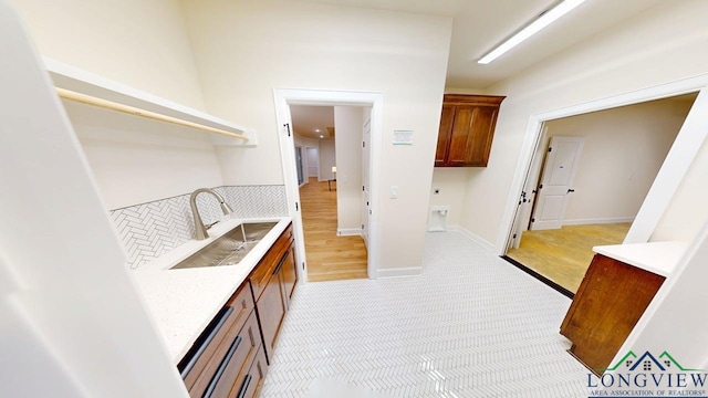 2509 Windmill Ln, Longview, TX 75601 - bar area featuring a sink and light carpet