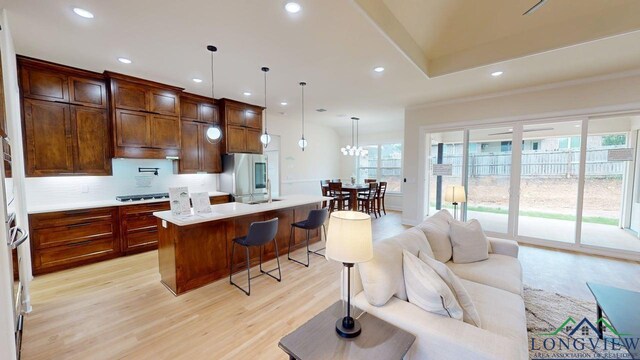 2509 Windmill Ln, Longview, TX 75601 - kitchen featuring smart refrigerator, light wood-style flooring, light countertops, gas cooktop, and recessed lighting