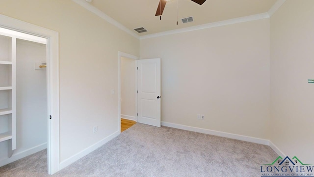 2509 Windmill Ln, Longview, TX 75601 - unfurnished bedroom with carpet flooring, ornamental molding, and a ceiling fan