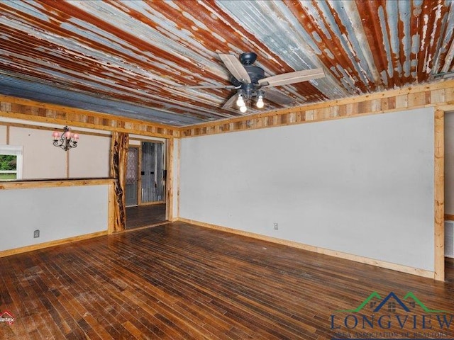 basement with wood-type flooring and ceiling fan