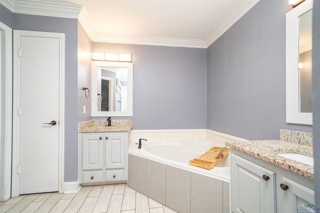 1505 Leach St, Kilgore, TX 75662 - full bathroom with two vanities, a bath, and ornamental molding