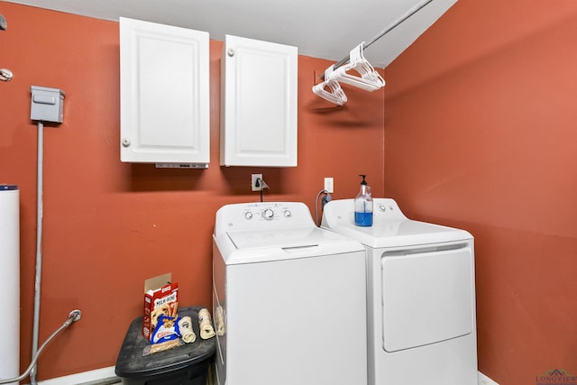 laundry room featuring cabinets and independent washer and dryer