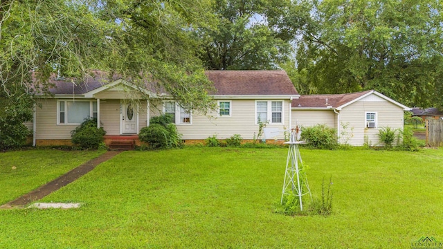 view of front of home with a front yard