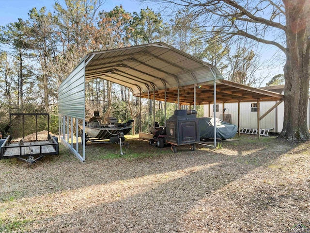 view of vehicle parking with a carport