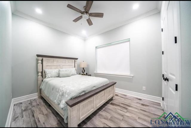 bedroom featuring crown molding, ceiling fan, light wood-type flooring, and baseboards