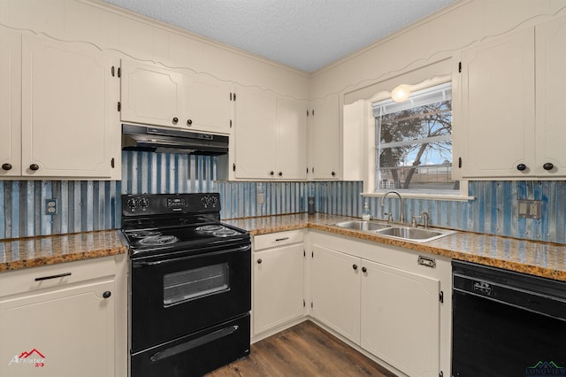 kitchen featuring black appliances, under cabinet range hood, dark wood-style floors, a textured ceiling, and a sink