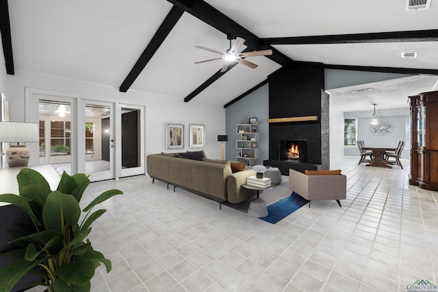 616 Cynthia St, Longview, TX 75605 - living room featuring light tile patterned floors, a fireplace, and ceiling fan