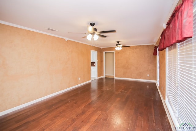 unfurnished room with baseboards, dark wood-type flooring, and ornamental molding