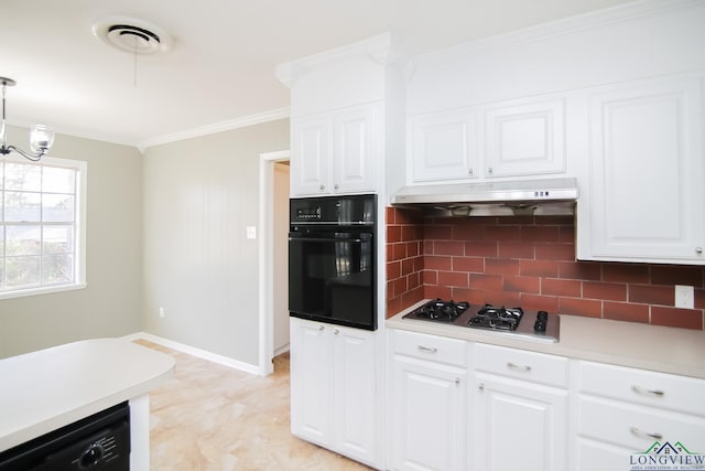 kitchen featuring visible vents, black appliances, under cabinet range hood, white cabinetry, and crown molding