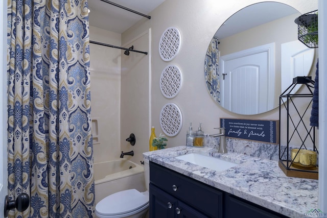 full bathroom with shower / bath combo, vanity, and toilet