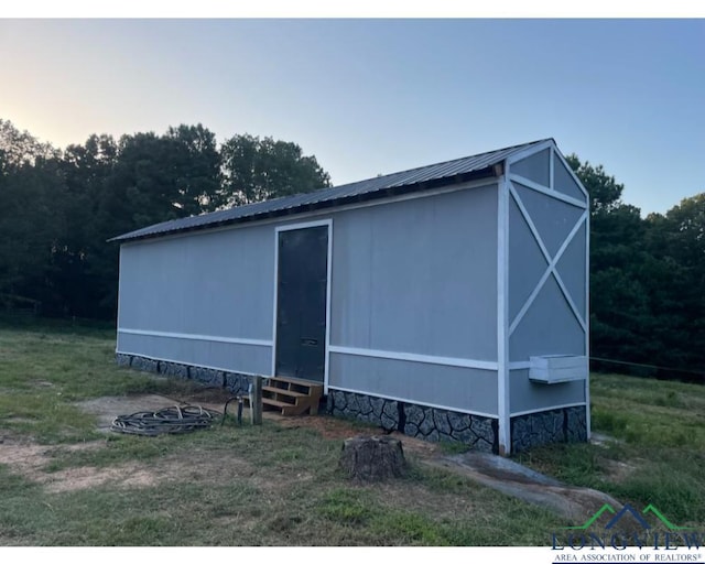 view of property exterior at dusk