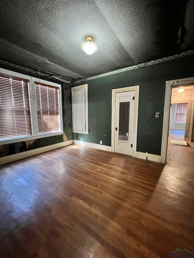 unfurnished bedroom featuring wood-type flooring