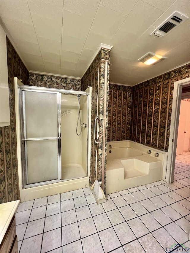 bathroom featuring tile patterned flooring, independent shower and bath, and crown molding