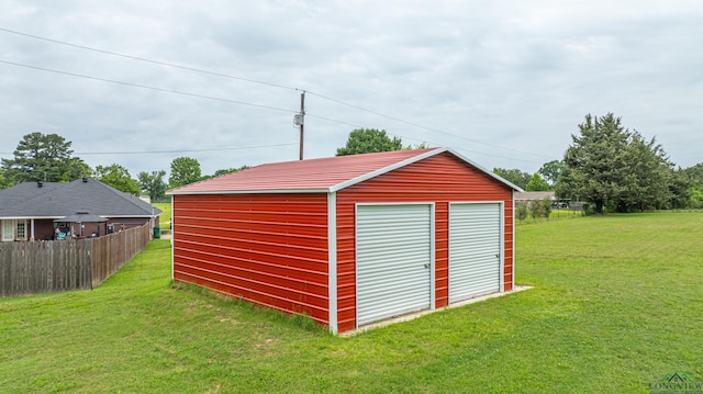 view of outdoor structure with a yard