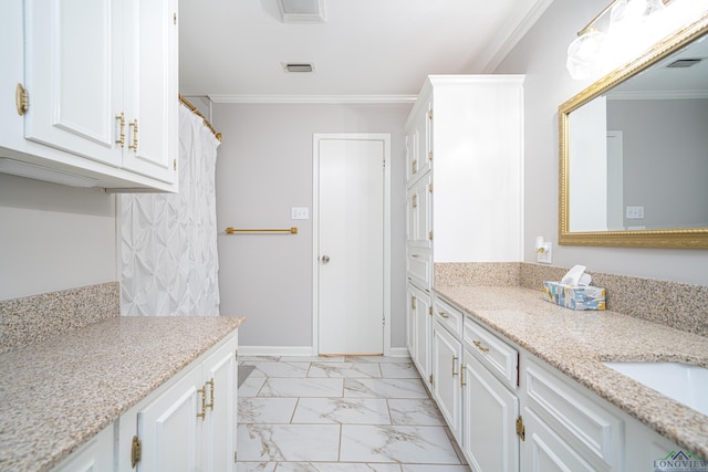 bathroom featuring vanity and ornamental molding