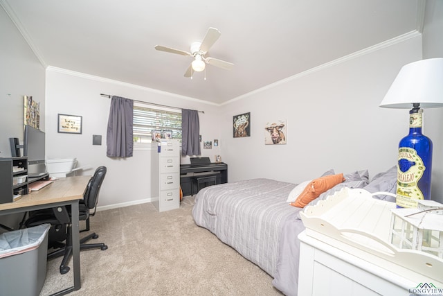 carpeted bedroom with ceiling fan and crown molding