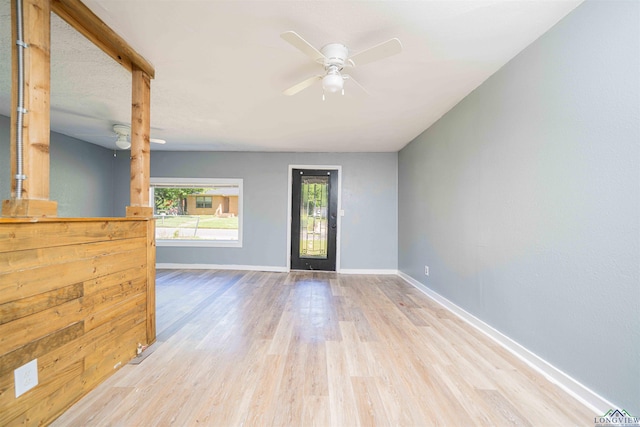115 Yates St, Mount Vernon, TX 75457 - unfurnished room with wood finished floors, baseboards, and a ceiling fan