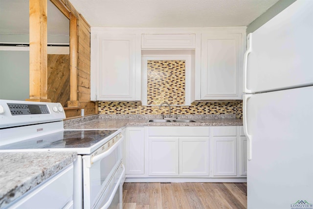 115 Yates St, Mount Vernon, TX 75457 - kitchen with white appliances, a sink, and white cabinetry