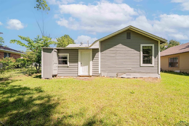 115 Yates St, Mount Vernon, TX 75457 - rear view of property featuring a lawn and crawl space