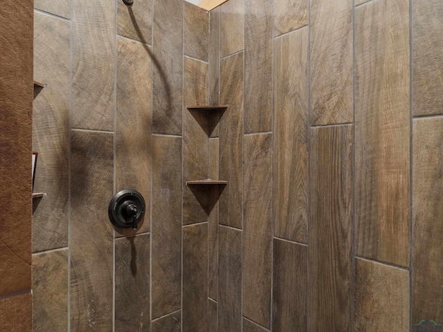 details featuring a tile shower