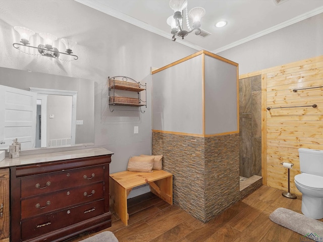 full bath with crown molding, walk in shower, a chandelier, toilet, and wood finished floors