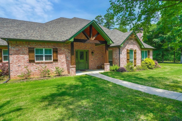 view of front of property with a front lawn