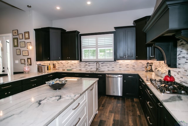 kitchen featuring light stone countertops, sink, stainless steel appliances, dark hardwood / wood-style floors, and custom exhaust hood