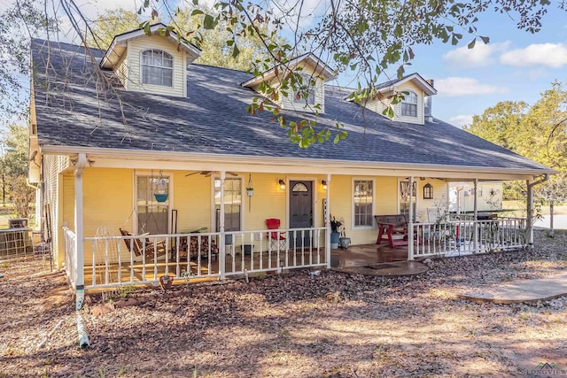 view of front of property featuring covered porch