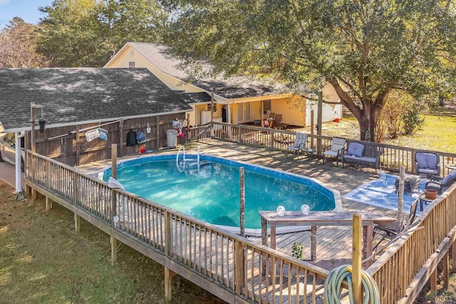 view of pool featuring a deck