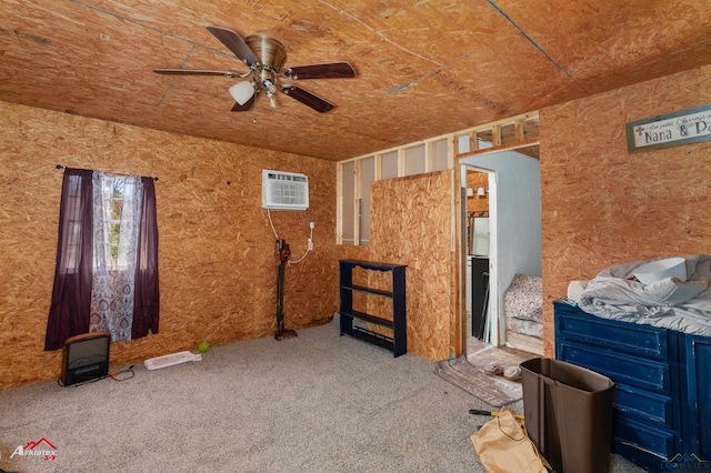 miscellaneous room featuring carpet, a wall unit AC, and ceiling fan