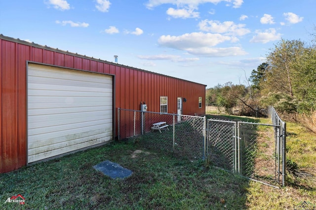 view of outbuilding featuring a garage