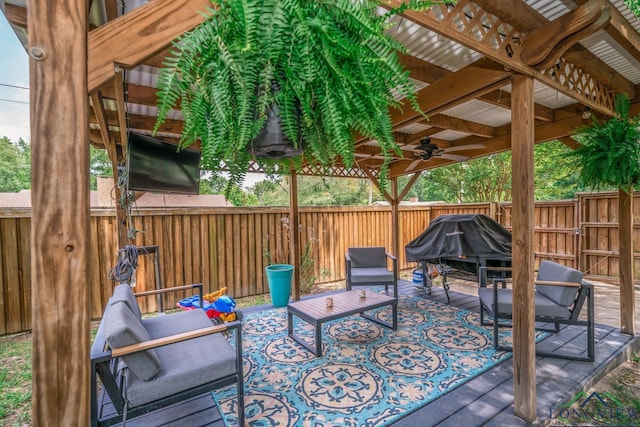 1002 Ruby St, Gilmer, TX 75644 - view of patio with a fenced backyard, an outdoor living space, a deck, and ceiling fan