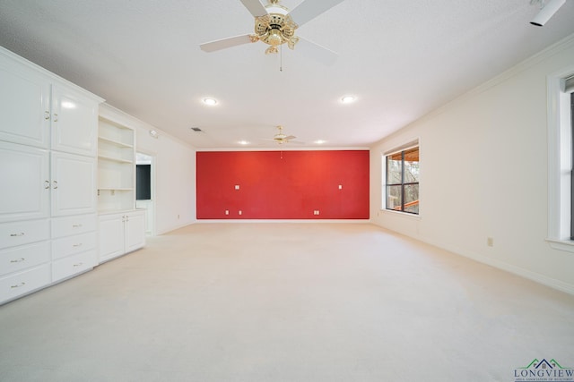 807 Vicksburg Ct, Longview, TX 75601 - unfurnished living room featuring ceiling fan, light carpet, ornamental molding, and recessed lighting
