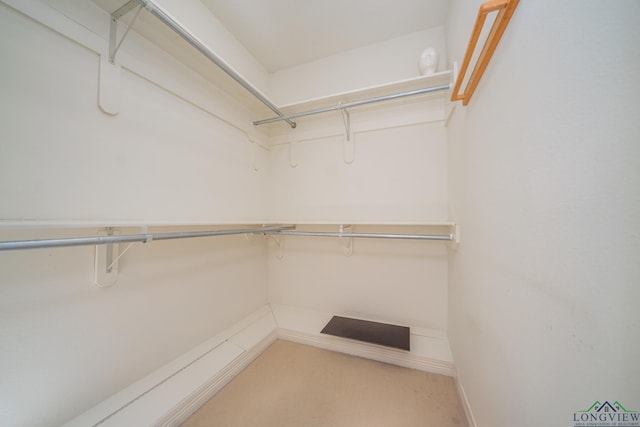 807 Vicksburg Ct, Longview, TX 75601 - spacious closet with carpet flooring