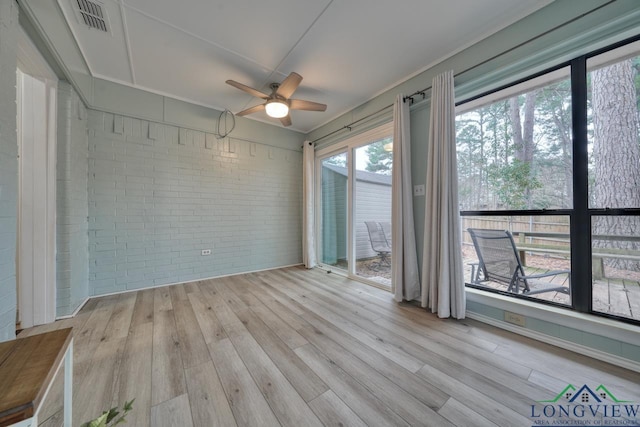 interior space featuring ceiling fan