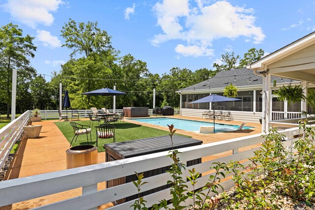 22732 Interstate 20e, Winona, TX 75792 - view of pool featuring a sunroom, a hot tub, and a patio