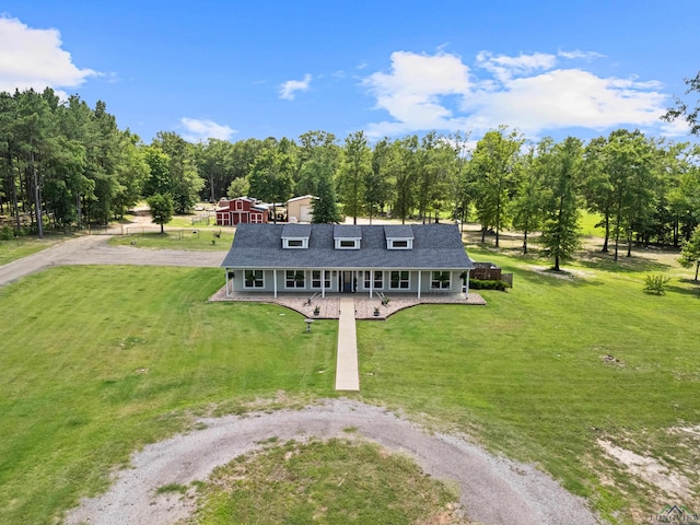 22732 Interstate 20e, Winona, TX 75792 - view of front of house with a porch, driveway, a front lawn, and view of scattered trees