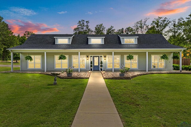 22732 Interstate 20e, Winona, TX 75792 - view of front of house featuring a lawn, covered porch, and roof with shingles