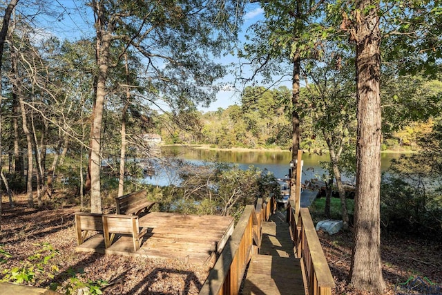 1483 County Road 1596, Avinger, TX 75630 - dock featuring a water view and a view of trees