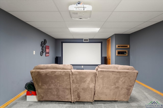 1483 County Road 1596, Avinger, TX 75630 - cinema room featuring a drop ceiling, baseboards, and carpet flooring