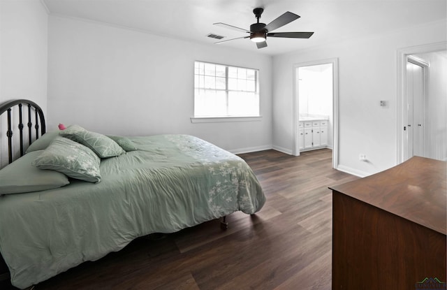 bedroom featuring ceiling fan, ensuite bathroom, and dark wood-type flooring