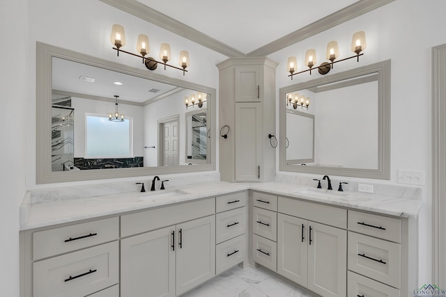 bathroom with crown molding and vanity