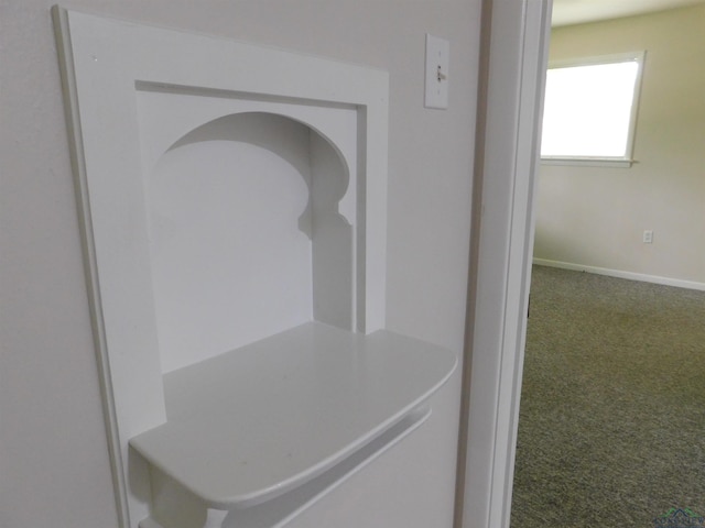 200 Hickory St, Gladewater, TX 75647 - detailed view of carpet and baseboards