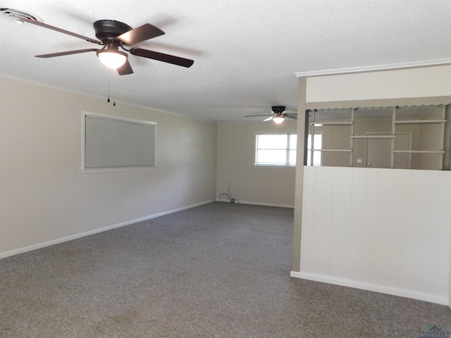 200 Hickory St, Gladewater, TX 75647 - spare room with ceiling fan, carpet, and ornamental molding