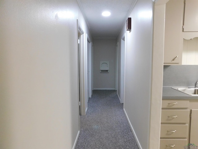200 Hickory St, Gladewater, TX 75647 - corridor with carpet and a sink